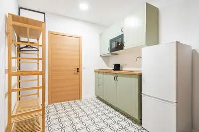 Una cocina o zona de cocina en Nice flat in Lavapiés at street level S23A