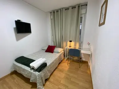 Cama o camas de una habitación en TravelStep Malasaña