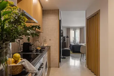 Una cocina o zona de cocina en Waou Gran Via Studio II - Corta Duración