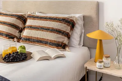 Cama o camas de una habitación en Waou Gran Via Studio III - Corta Duración