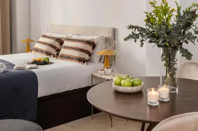 Cama o camas de una habitación en Waou Gran Via Studio IV - Corta Duración