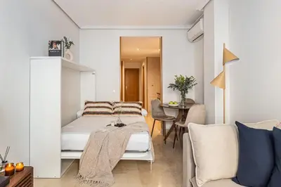 Cama o camas de una habitación en Waou Gran Via Apartment IV - Corta Duración