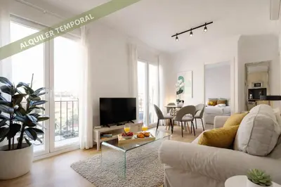 Una televisión o centro de entretenimiento en Madrid Río Suites