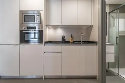 Una cocina o zona de cocina en Cozy 2-Bed Apartment for 3 in La Latina