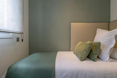 Cama o camas de una habitación en Cozy 2-Bed Apartment for 3 in La Latina