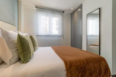 Cama o camas de una habitación en Cozy 2-Bed Apartment in La Latina Madrid