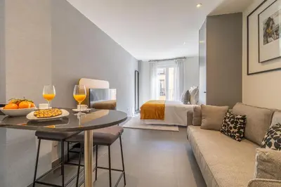 Zona de estar de Cozy loft near rastro Latina