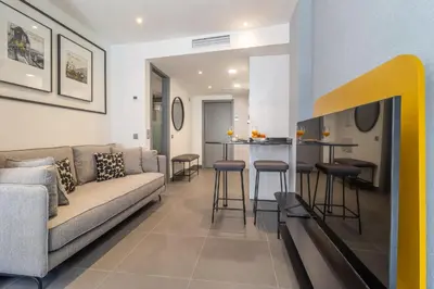 Zona de estar de Cozy loft near rastro Latina