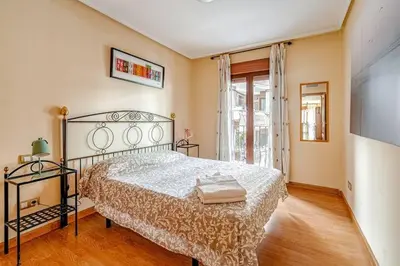 Cama o camas de una habitación en Acogedor, luminoso y centrico