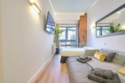 Cama o camas de una habitación en ººRS CityCentre DownTown WiFi AC SmartTVºº