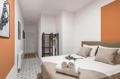 Cama o camas de una habitación en Charming Urban Madrid