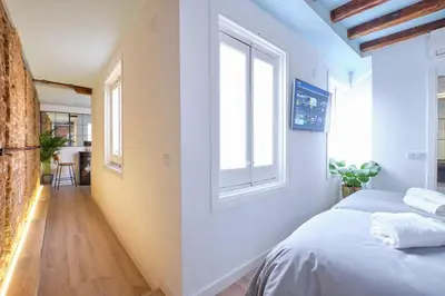 Cama o camas de una habitación en ºPY Historical CityCentre WiFi AC SmartTVº