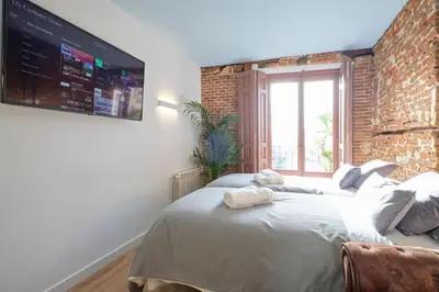 Cama o camas de una habitación en ººººººPY Historical CityCentre WiFi AC SmartTVºººººº