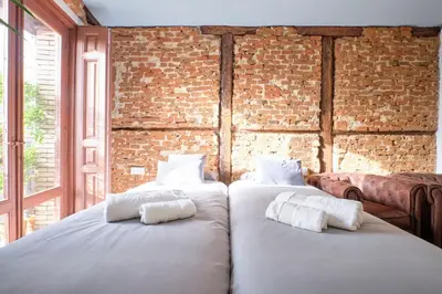 Cama o camas de una habitación en ººººººPY Historical CityCentre WiFi AC SmartTVºººººº