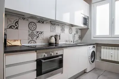 Una cocina o zona de cocina en AH- Retiro - Estilo urbano junto al parque más emblemático