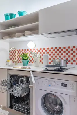 Una cocina o zona de cocina en Apartamento para 9 personas en Malasaña