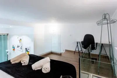 Cama o camas de una habitación en Industrial style duplex