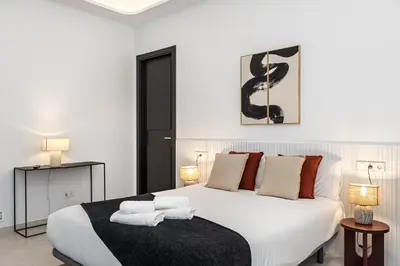 Cama o camas de una habitación en Waou Urban Home Salamanca V