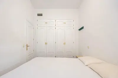 Cama o camas de una habitación en Suites Toro La Latina -AH