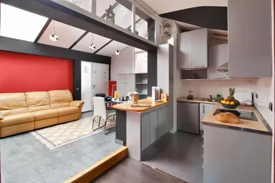 Una cocina o zona de cocina en Apartamentos El Tiempo Madrid