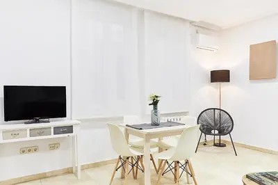 Una televisión o centro de entretenimiento en LEEWAYS LOFT XXXI in GRAN VÍA