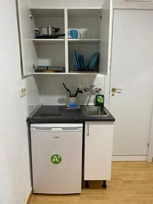 Una cocina o zona de cocina en Apartamentos SmartRenting Justicia