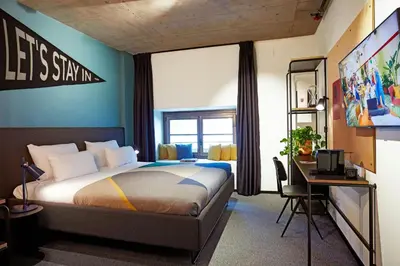 Cama o camas de una habitación en The Social Hub Madrid