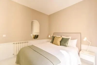 Cama o camas de una habitación en Apartamento Embajadores XVI